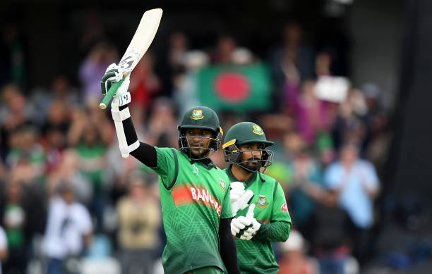 TAUNTON, ENGLAND - JUNE 17: Shakib Al Hasan of Bangladesh celebrates his century with Liton Das of Bangladesh during the Group Stage match of the ICC Cricket World Cup 2019 between West Indies and Bangladesh at The County Ground on June 17, 2019 in Taunton, England. (Photo by Alex Davidson/Getty Images)